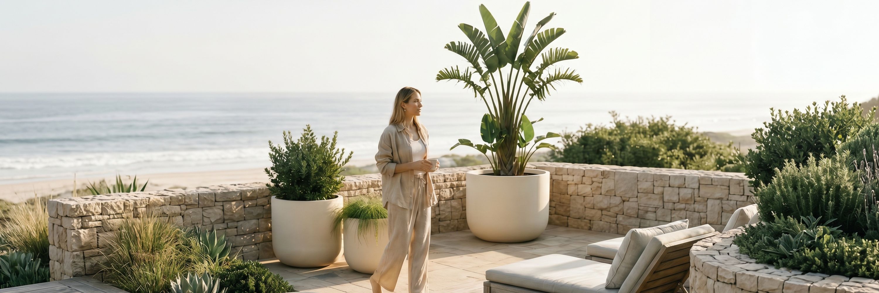 Planters in neutral tones with rounded and ribbed designs for indoor and outdoor styling