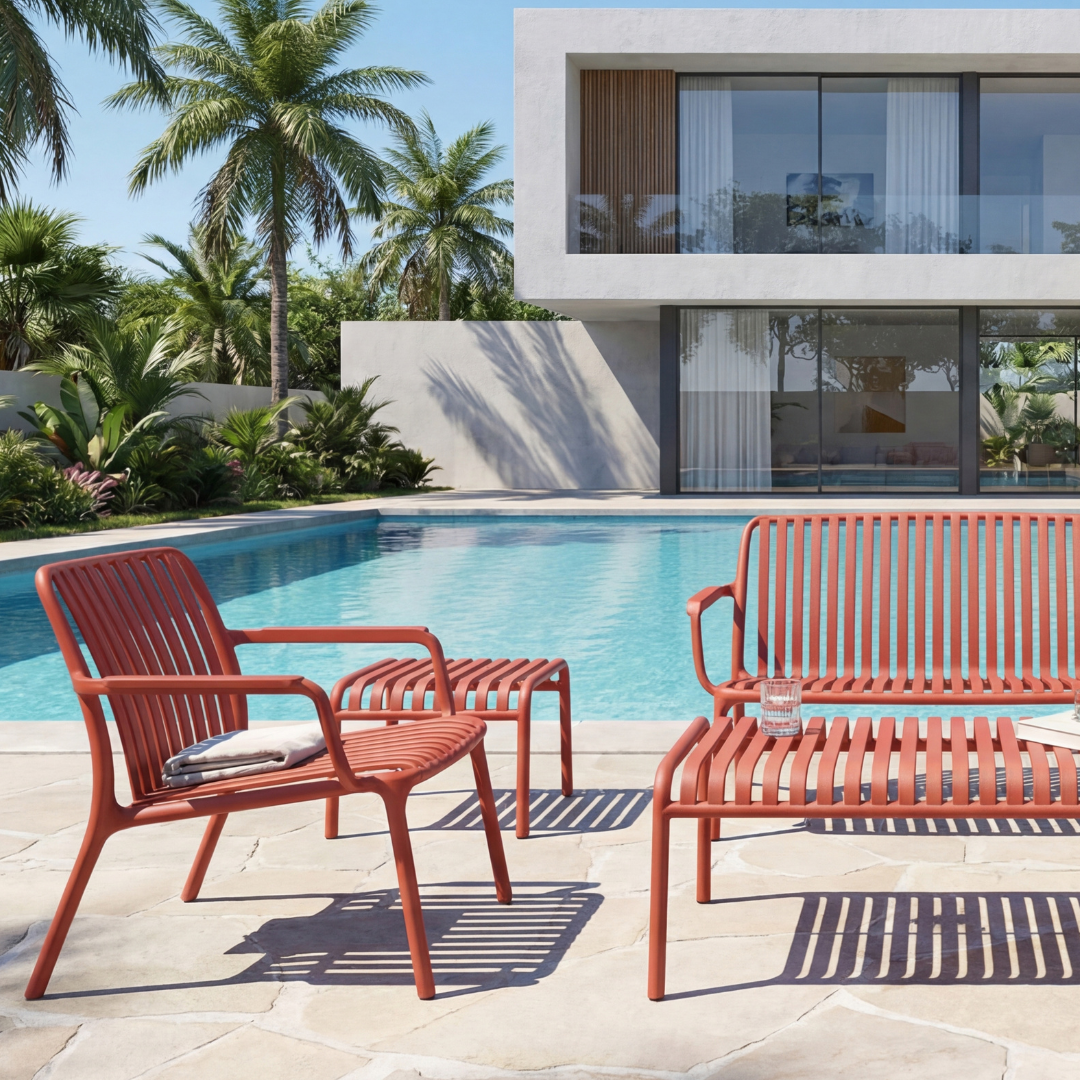 Cabo 6pc Lounge Set Terracotta shown beside a swimming pool with a chair, side table and 2-seater bench